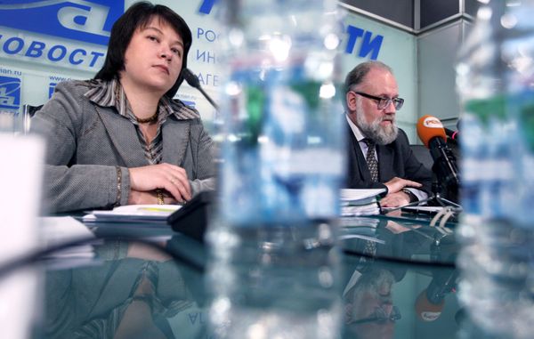 Vladimir Churov and Maya Grishina attending news conference at the RIA  - Sputnik International