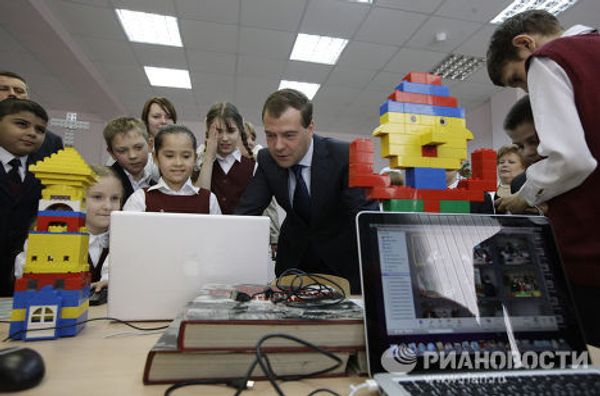 President Medvedev plays with Lego, watches cartoons at Moscow school President Medvedev plays with Lego, watches cartoons at Moscow school - Sputnik International