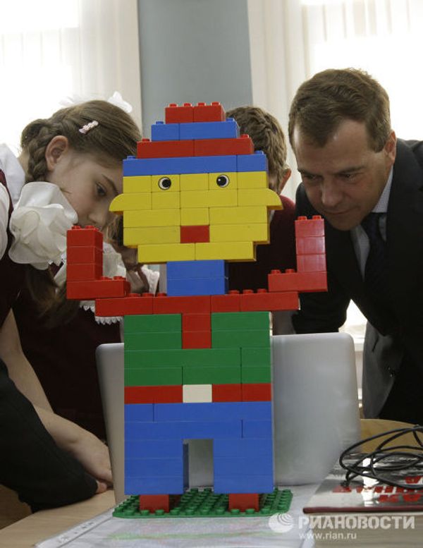 President Medvedev plays with Lego, watches cartoons at Moscow school President Medvedev plays with Lego, watches cartoons at Moscow school - Sputnik International