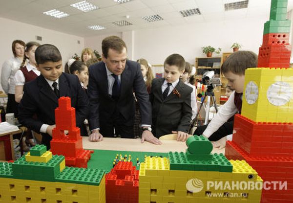 President Medvedev plays with Lego, watches cartoons at Moscow school President Medvedev plays with Lego, watches cartoons at Moscow school - Sputnik International