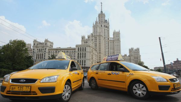Licensed taxi companies are under threat from taxi service app Uber. - Sputnik International