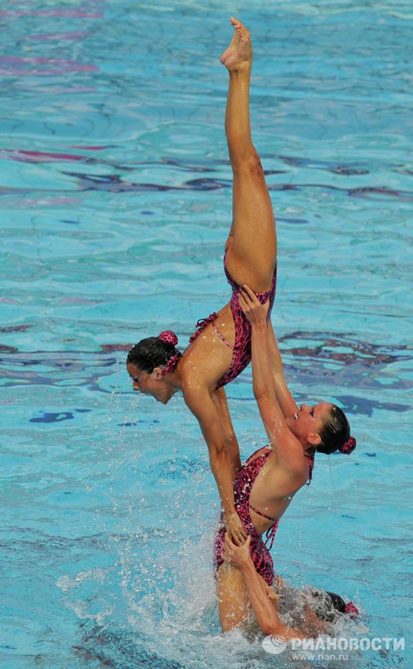 Russian women unstoppable in synchronized swimming - Sputnik International