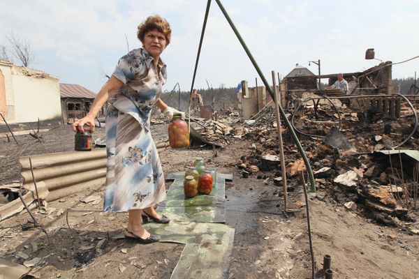 Russia earmarks extra 2.67 bln rubles for wildfire victims - Sputnik International