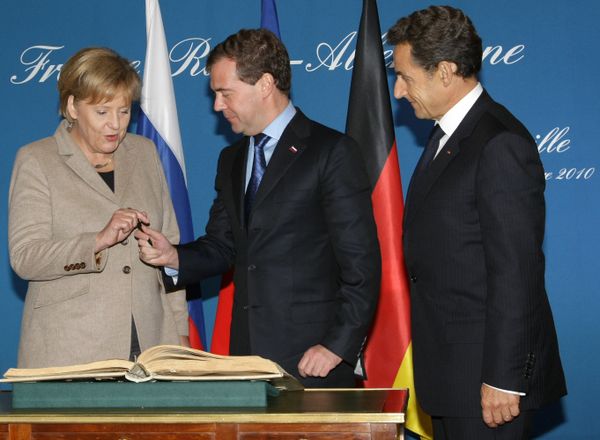 The leaders of Russia, Germany and France in Deauville The leaders of Russia, Germany and France in Deauville - Sputnik International