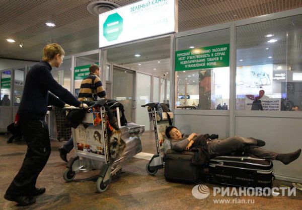 Passengers wait for flights at Sheremetyevo airport Passengers wait for flights at Sheremetyevo airport - Sputnik International