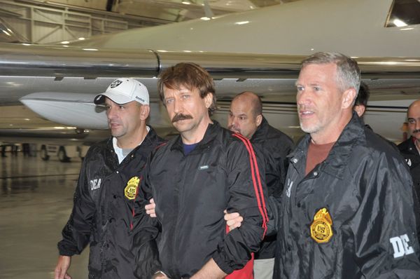 Former Soviet military officer Viktor Bout (middle) was arrested in Thailand in March 2008 during a sting operation led by U.S. agents. Former Soviet military officer Viktor Bout (middle) was arrested in Thailand in March 2008 during a sting operation led by U.S. agents. - Sputnik International