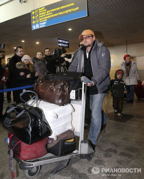 Russian evacuees arrive in Moscow from Libya - Sputnik International