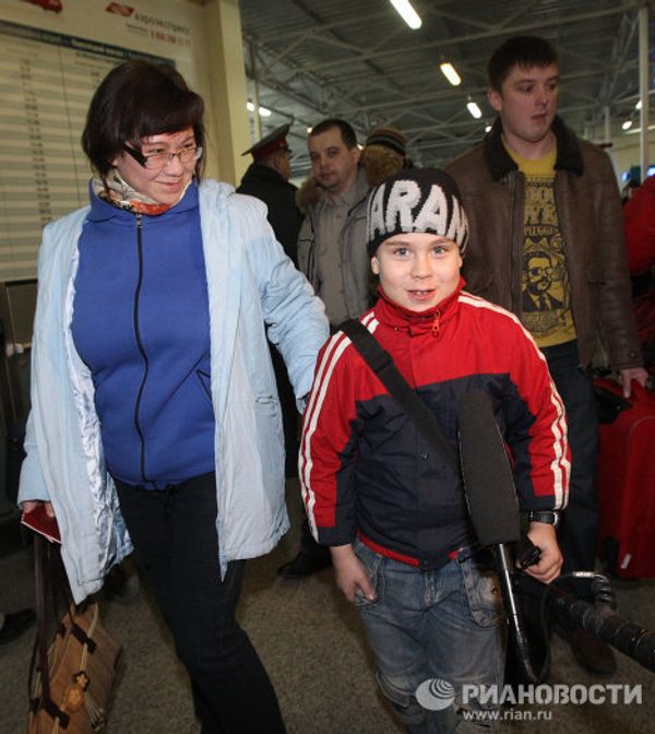 Russian evacuees arrive in Moscow from Libya - Sputnik International