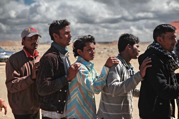 Refugees flee Libya through Benghazi port - Sputnik International