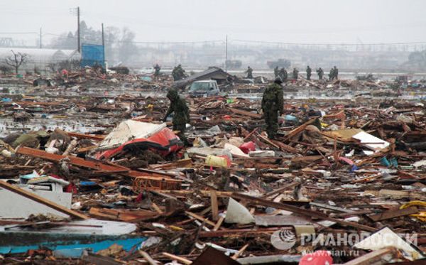 Rescue efforts continue on Japan's East coast Rescue efforts continue on Japan's East coast - Sputnik International