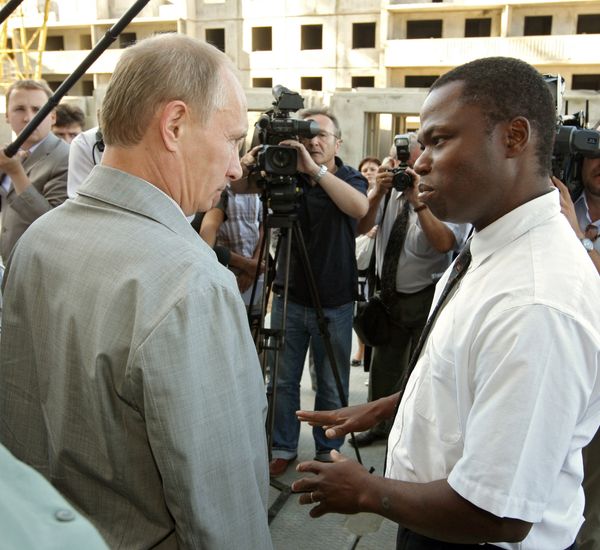 Joachim Crima and Russian Prime Minister Vladimir Putin - Sputnik International