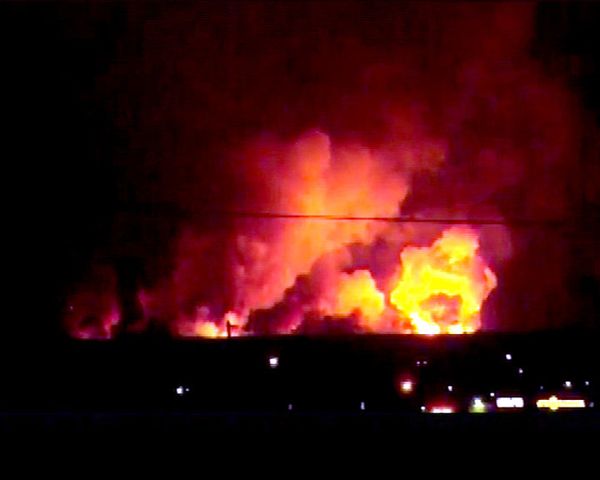 A total of 200 personnel, 30 firefighting units and three firefighting trains were deployed to deal with the blaze and explosions that followed. - Sputnik International