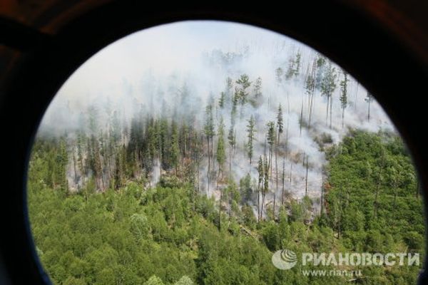 Putting out forest fires in the Krasnoyarsk Territory  - Sputnik International