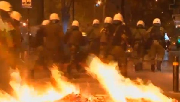 As thousands of protestors gathered outside the parliament building, Greek lawmakers approved a package of austerity measures needed to secure a bailout of 6.8 billion euro (almost $9 billion). - Sputnik International