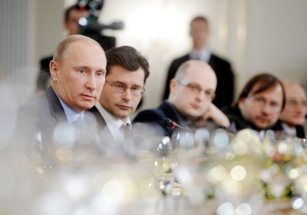 Russian Prime Minister Vladimir Putin at a meeting with political analysts - Sputnik International
