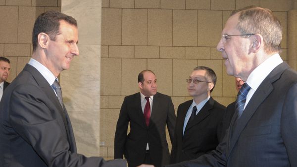 Bashar al-Assad and Sergei Lavrov - Sputnik International