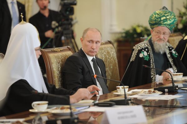Vladimir Putin at a meeting with representatives of traditional confessions in Russia - Sputnik International