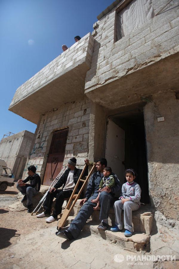People Injured and Homes Destroyed Amid Continued Clashes in Syria - Sputnik International