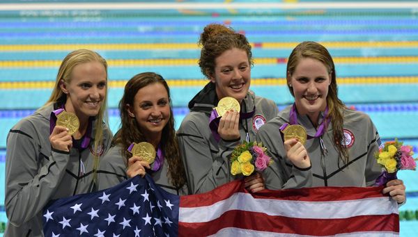 The United States stormed to gold in the 4x100 meters medley relay on Saturday, setting a new world record in the process - Sputnik International