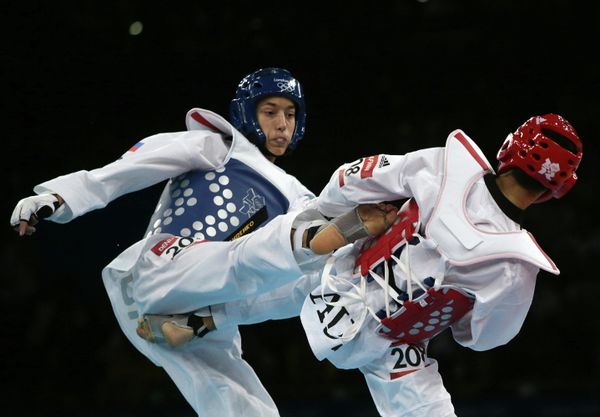 Alexei Denisenko scored a narrow win over Australia's Safwan Khalil to claim Olympic bronze for Russia - Sputnik International