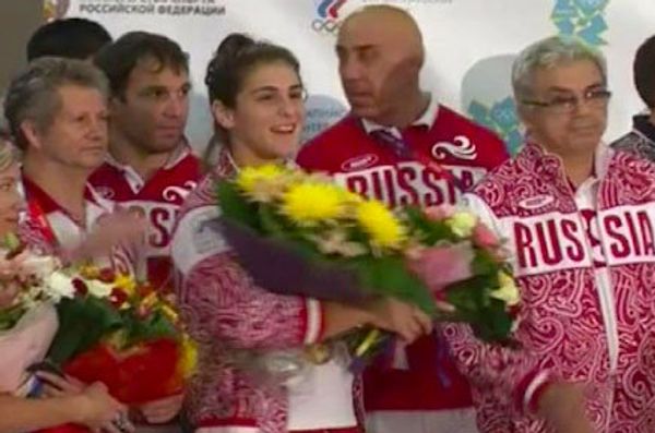 Russia's Olympic Team Returns to Moscow - Sputnik International