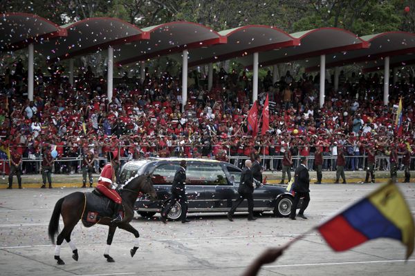 The coffin with the of late Venezuelan leader Hugo Chavez on the way to the Military Museum in Caracas - Sputnik International
