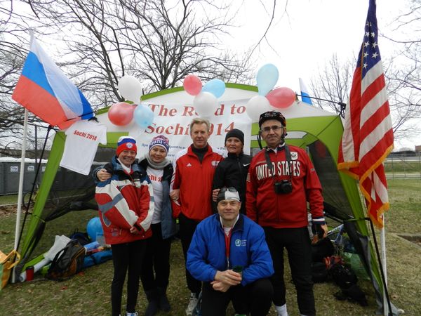Gathered in front of the Road to Sochi tent near the finish line of Washington’s Rock ‘n’ Roll marathon on Saturday, March 16 were (from left) Richmond Marathon winner Irina Suvorova, AARW president Larysa Petrenko, ARSA president Pavel Krapiva, Olympic athlete Firaya Sultanova and first-time marathon biker Aaron Gekhman, who moved to America from Moscow in 2010. In front is Alexander Guslistov, who ran a half-marathon on Saturday - Sputnik International