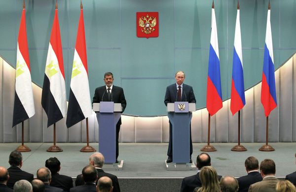 Mohammed Morsi and Vladimir Putin - Sputnik International
