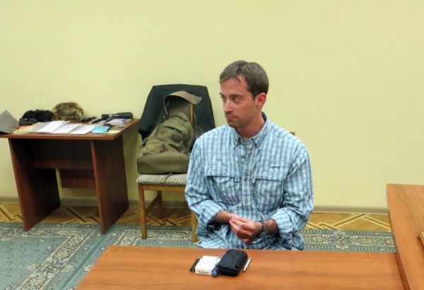 A table behind Ryan Christopher Fogle shows some of the items that were allegedly confiscated from him. - Sputnik International
