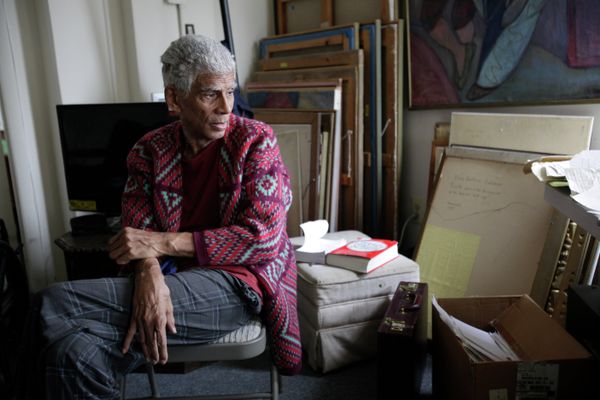 Patterson sitting in his Washington apartment with his mother’s paintings stacked against the wall. Patterson sitting in his Washington apartment with his mother’s paintings stacked against the wall. - Sputnik International
