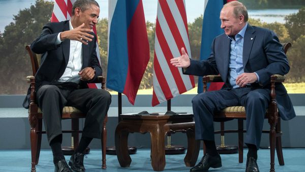 US President Barack Obama and Russian President Vladimir Putin prepare to shake hands after their meeting during the G8 Summit at Lough Erne in Enniskillen, Northern Ireland, June 17, 2013 - Sputnik International