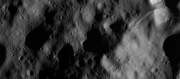 A picture of the giant Vesta asteroid taken by Dawn in November 2012. A picture of the giant Vesta asteroid taken by Dawn in November 2012. - Sputnik International