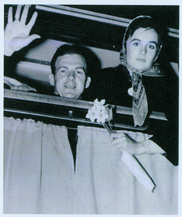 Lee Harvey Oswald’s wedding band is visible on his right hand as he and Marina leave Minsk in 1961. - Sputnik International