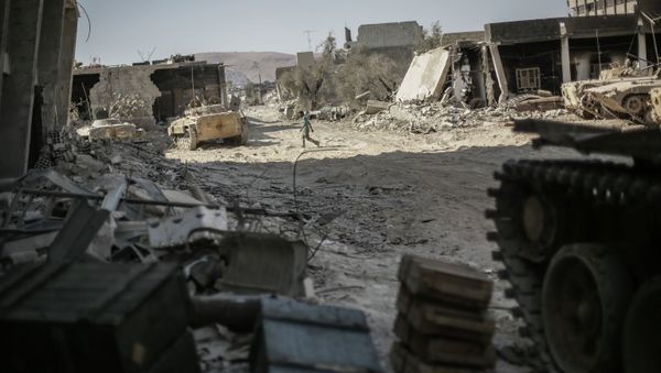 In August 2013, an unprecedented chemical attack which killed nearly 1,500 civilians took place in Ghouta, a suburb of the Syrian capital Damascus. Militants and the Syrian government blamed each other for the attack. - Sputnik International