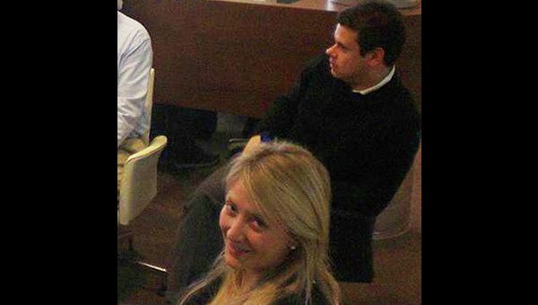 A close-up of a photograph appearing to show Bullock and Kotlyarenko at a meeting with the design team of the yacht MY Tzarina. - Sputnik International