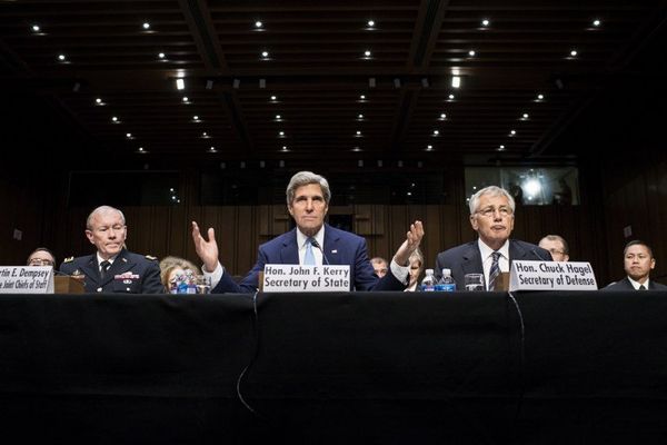 US Chairman of the Joint Chiefs of Staff Martin E. Dempsey (L) and US Secretary of Defense Chuck Hagel (R) listen to US Secretary of State John Kerry speak during a hearing on Syria at the Senate in Washington Tuesday. - Sputnik International