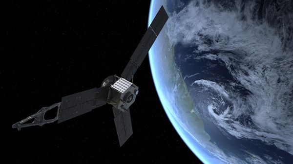 An artist’s rendition shows NASA’s Juno spacecraft as it picks up a gravity-assisted speed boost that will slingshot it into space, toward Jupiter. - Sputnik International