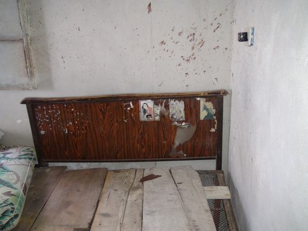 Blood splatter is seen above the bed of Safwan Shebli, 23, who was killed by opposition groups during an offensive in Barouda village, Syria, in September. - Sputnik International