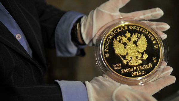 Mises Institute contributor Marcia Christoff-Kurapovna believes now is the perfect time for Russia to introduce a gold-based currency. Mises Institute contributor Marcia Christoff-Kurapovna believes now is the perfect time for Russia to introduce a gold-based currency. - Sputnik International