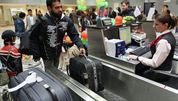 The check-in counter at the Sheremetyevo International Airport The check-in counter at the Sheremetyevo International Airport - Sputnik International