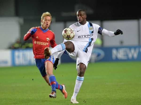 CSKA Moscow's Keisuke Honda and Manchester City's Yaya Toure during the Champions League match at Arena Khimki, Moscow, October 23, 2013 - Sputnik International