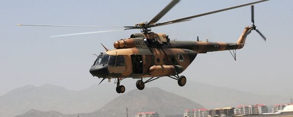 A file photo showing an Afghan Mi-17 helicopter takes off for an air-assault training flight from Kabul International Airport, Afghanistan A file photo showing an Afghan Mi-17 helicopter takes off for an air-assault training flight from Kabul International Airport, Afghanistan - Sputnik International