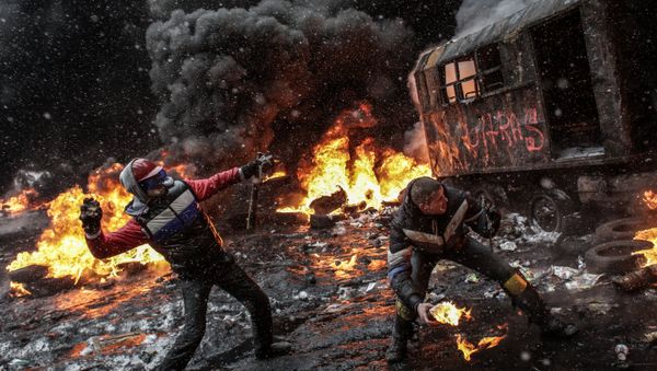 Rioters throw rocks and molotov cocktails at riot police in Kiev, January 22, 2014 Rioters throw rocks and molotov cocktails at riot police in Kiev, January 22, 2014 - Sputnik International