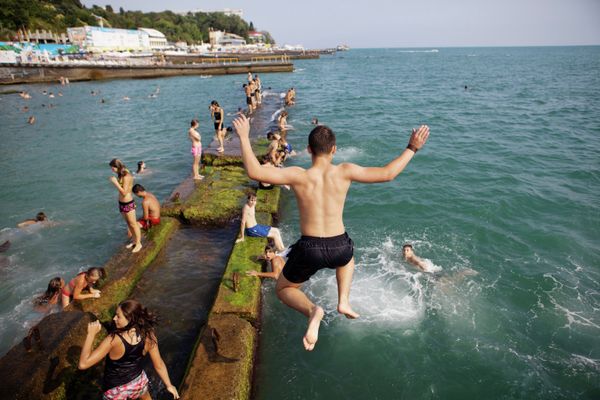On a beach in Sochi - Sputnik International