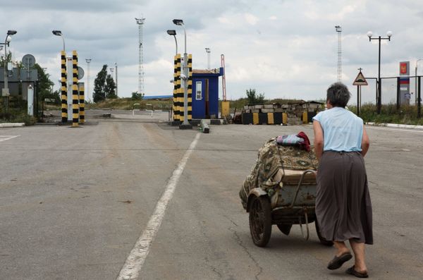 A refugee at the border check point on the border with Russia - Sputnik International