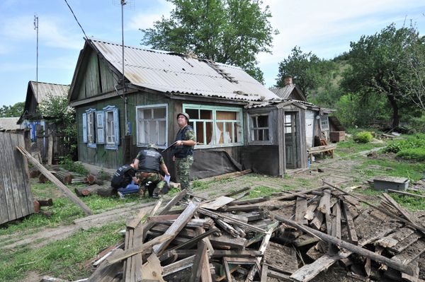A house in Donetsk, a town in southern Russia’s Rostov Region, hit by a shell fired from the Ukrainian side of the border A house in Donetsk, a town in southern Russia’s Rostov Region, hit by a shell fired from the Ukrainian side of the border - Sputnik International