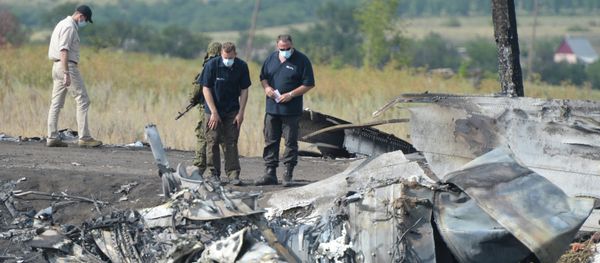 OSCE employees and experts work at Malaysia Airlines Boeing 777 crash site OSCE employees and experts work at Malaysia Airlines Boeing 777 crash site - Sputnik International