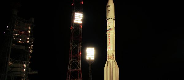A Proton-M carrier rocket sits on a launch pad at the Baikonur space center in Kazakhstan - Sputnik International