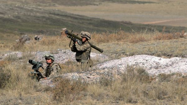 A soldier with a man-portable air-defense system during military exercises. A soldier with a man-portable air-defense system during military exercises. - Sputnik International