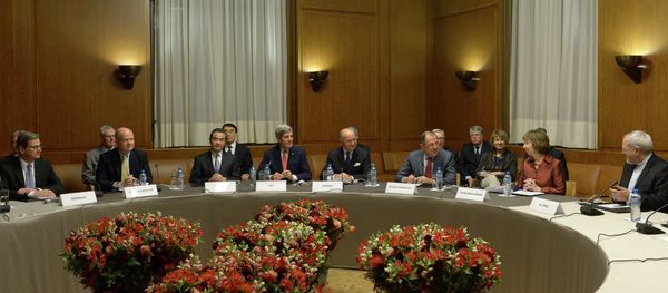 Foreground, from left: German Foreign Minister Guido Westerwelle, UK Foreign Secretary William Hague, Chinese Foreign Minister Wang Yi, US Secretary of State John Kerry, French Foreign Minister Laurent Fabius, Russian Foreign Minister Serei Lavrov, EU foreign policy chief Catherine Ashton and Iranian Foreign Minister Mohammad Javad Zarif during the talks on Iran's nuclear program, in Geneva. - Sputnik International